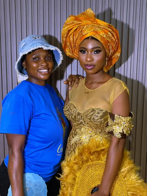A student in a denim hat beside a finished gold makeup and headwrap look