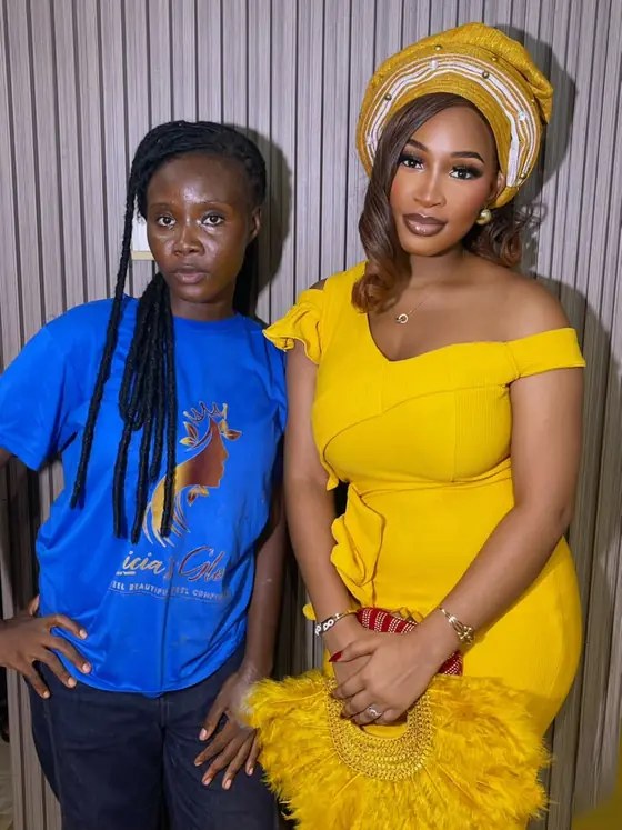 A student with long braids beside a finished makeup look in yellow